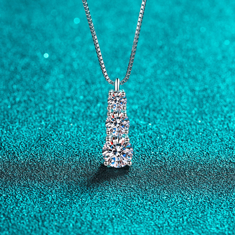 Diamond necklace on a teal textured background